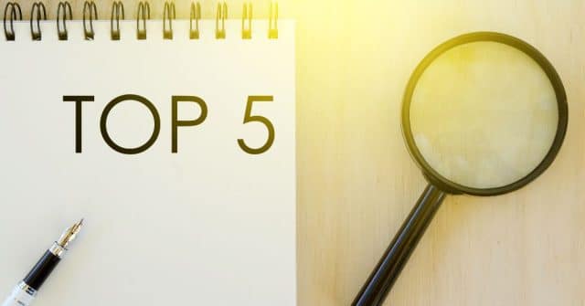 top 5 with pen and magnifying glass