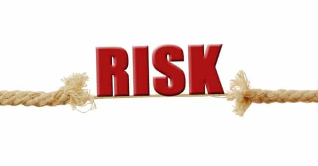 Frayed rope with Risk in red letters