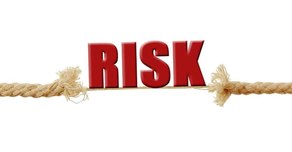 Frayed rope with Risk in red letters