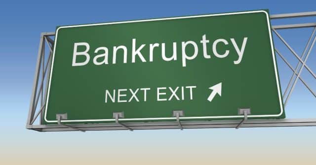 bankruptcy next exit road sign